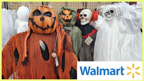 Our favorite witch comes holding a pumpkin that reads "Tonight we fly. . Walmart halloween animatronics